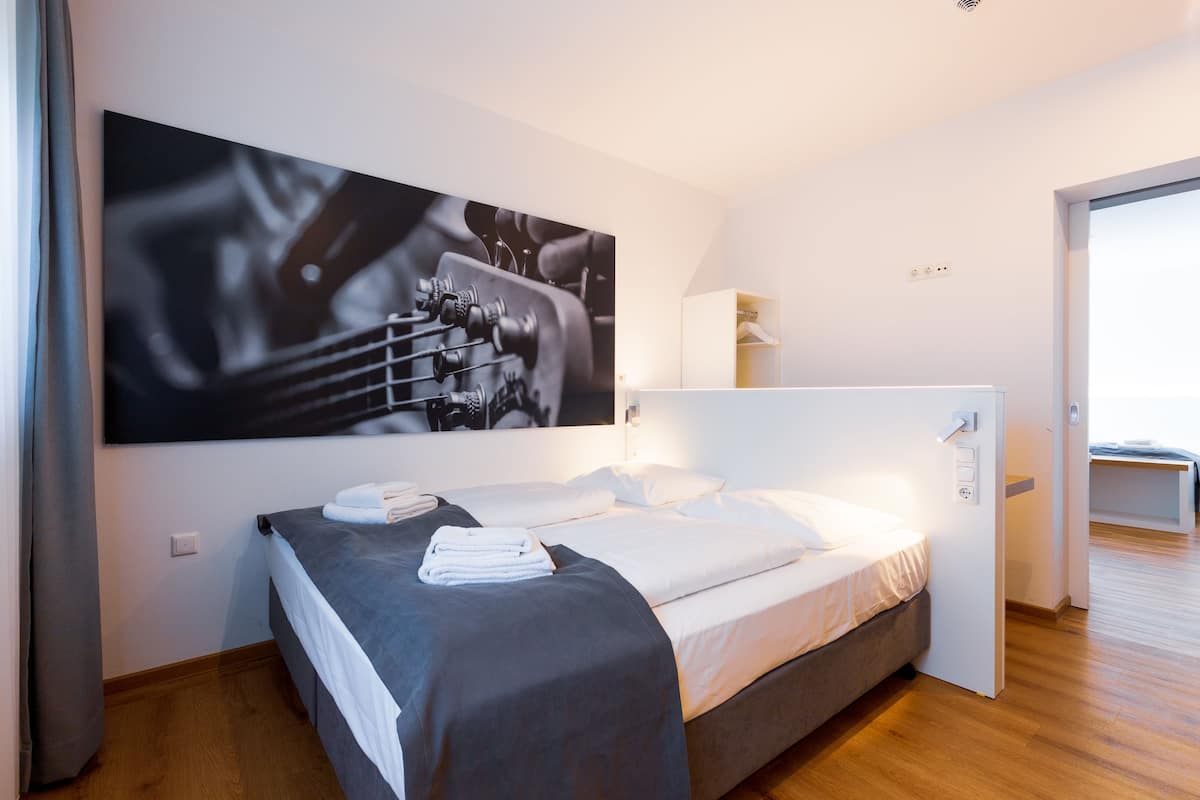 Hypo-allergenic bedding, desk, laptop workspace, soundproofing