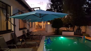 Outdoor pool, pool umbrellas, pool loungers