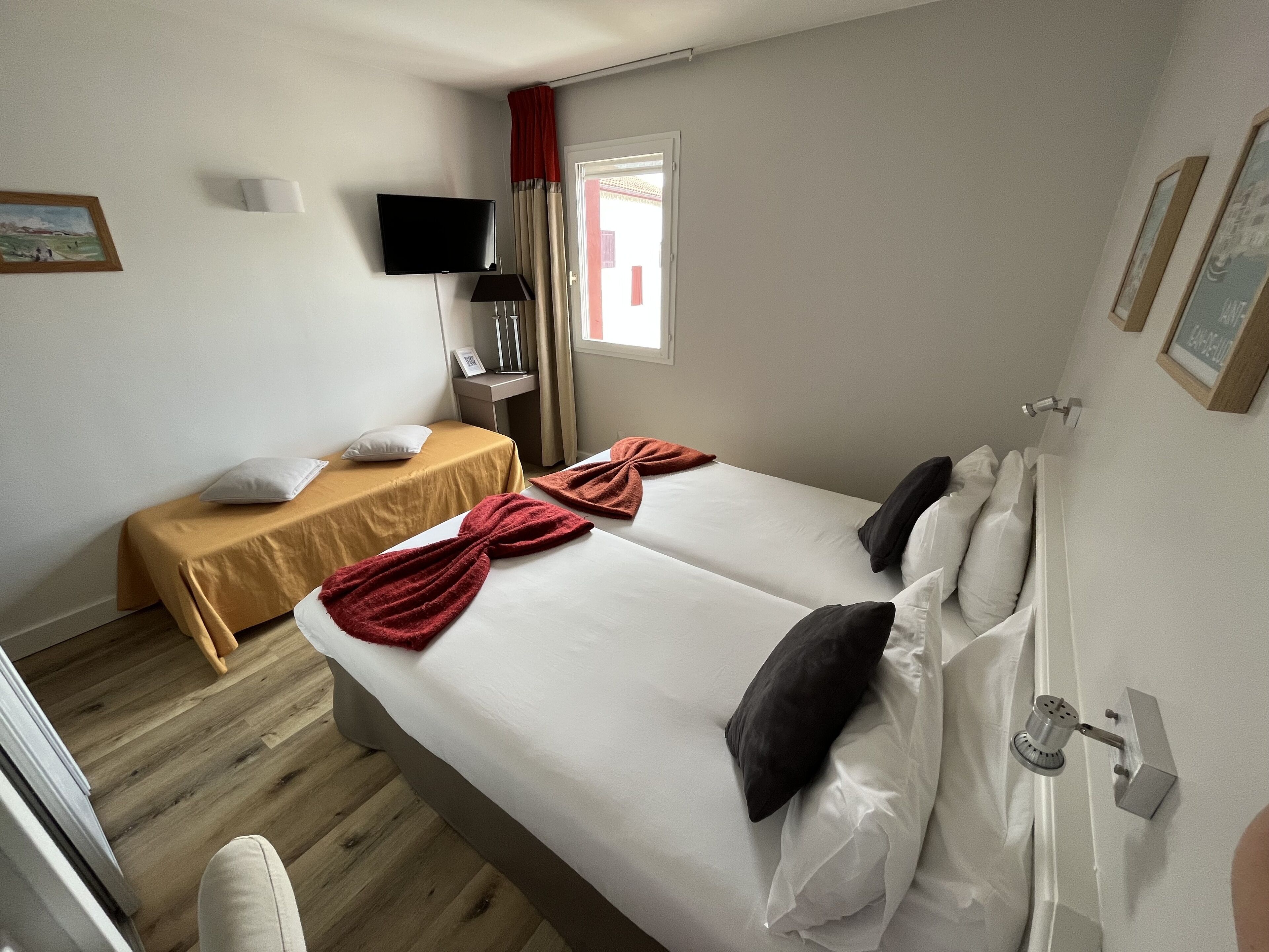 basic triple room | 1 bedroom, memory-foam beds, minibar, individually decorated