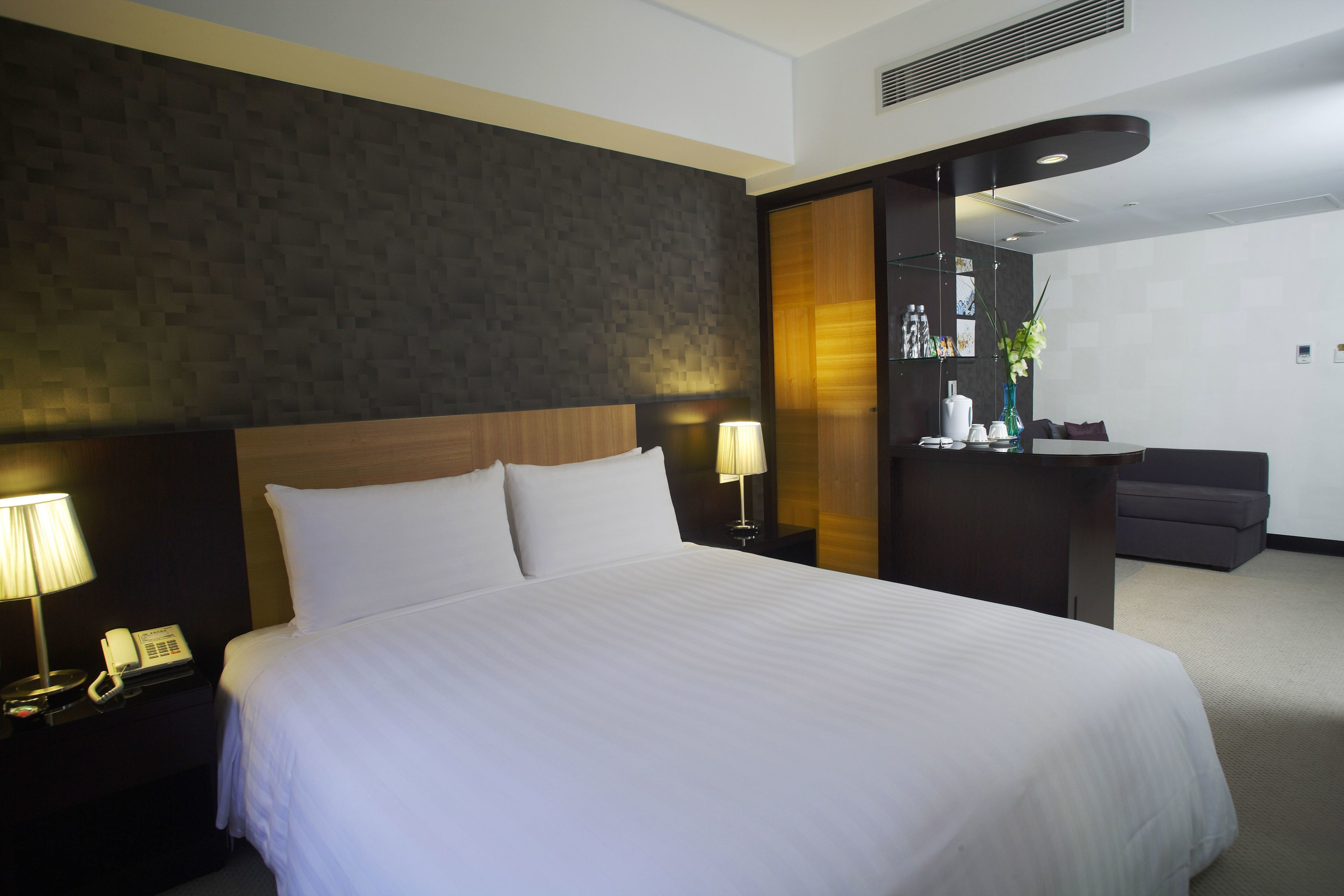 vip room | in-room safe, desk, blackout curtains, bed sheets