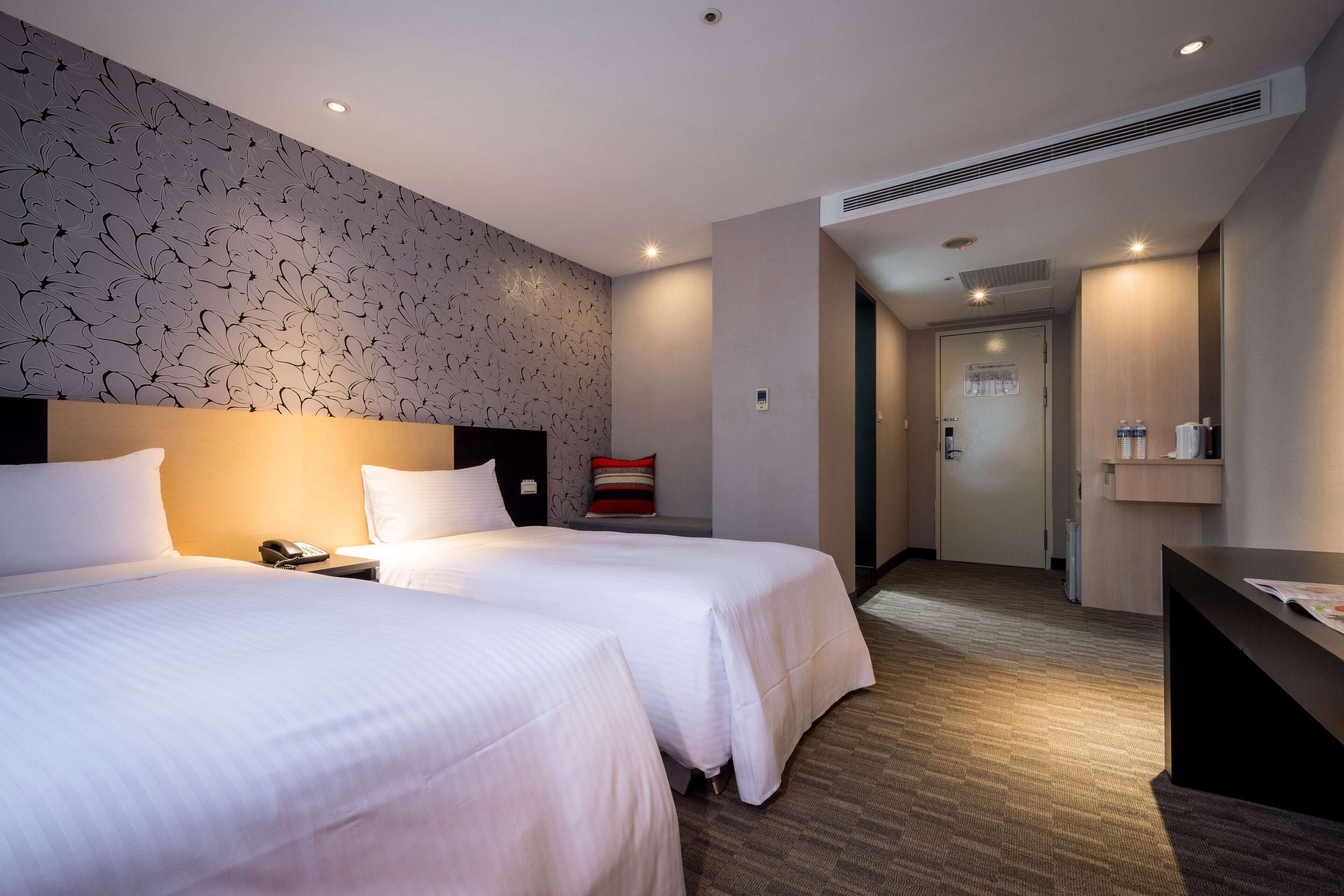 business twin room, 2 single beds | in-room safe, desk, blackout curtains, bed sheets