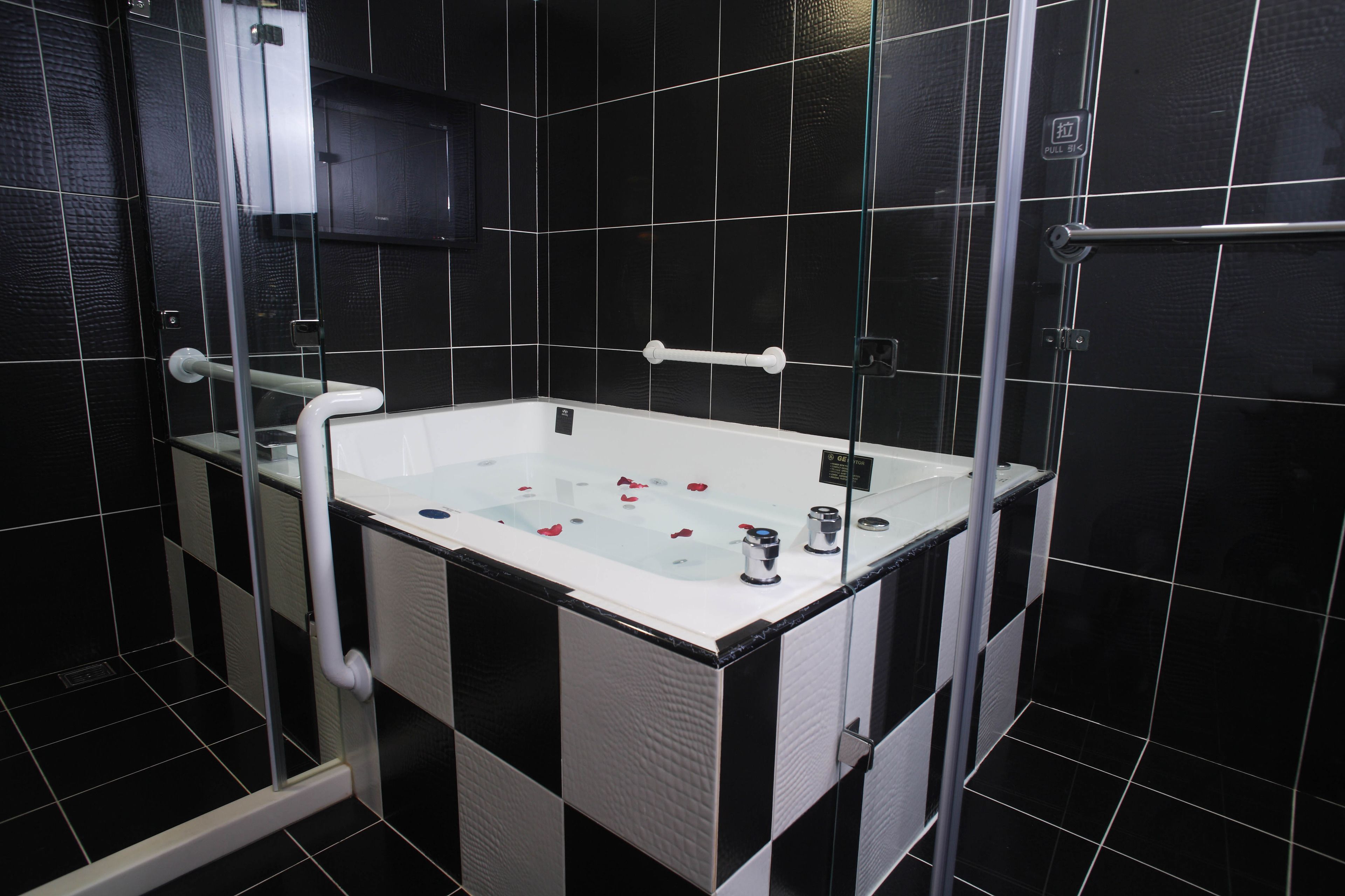 executive suite, 1 king bed | bathroom | free toiletries, hair dryer, slippers, towels