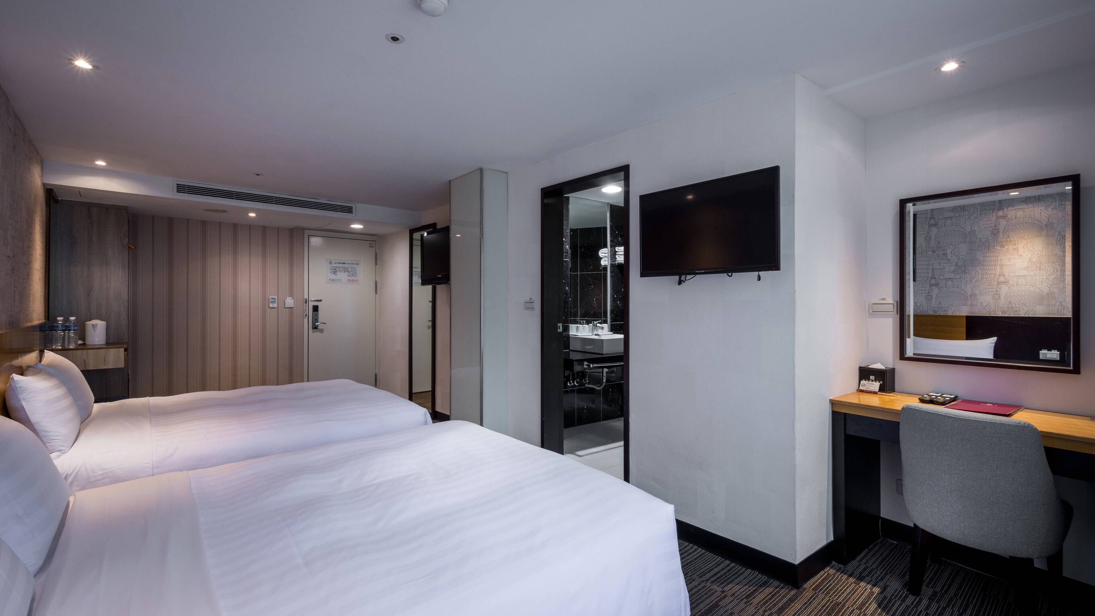 quadruple room, 2 double beds | in-room safe, desk, blackout curtains, bed sheets