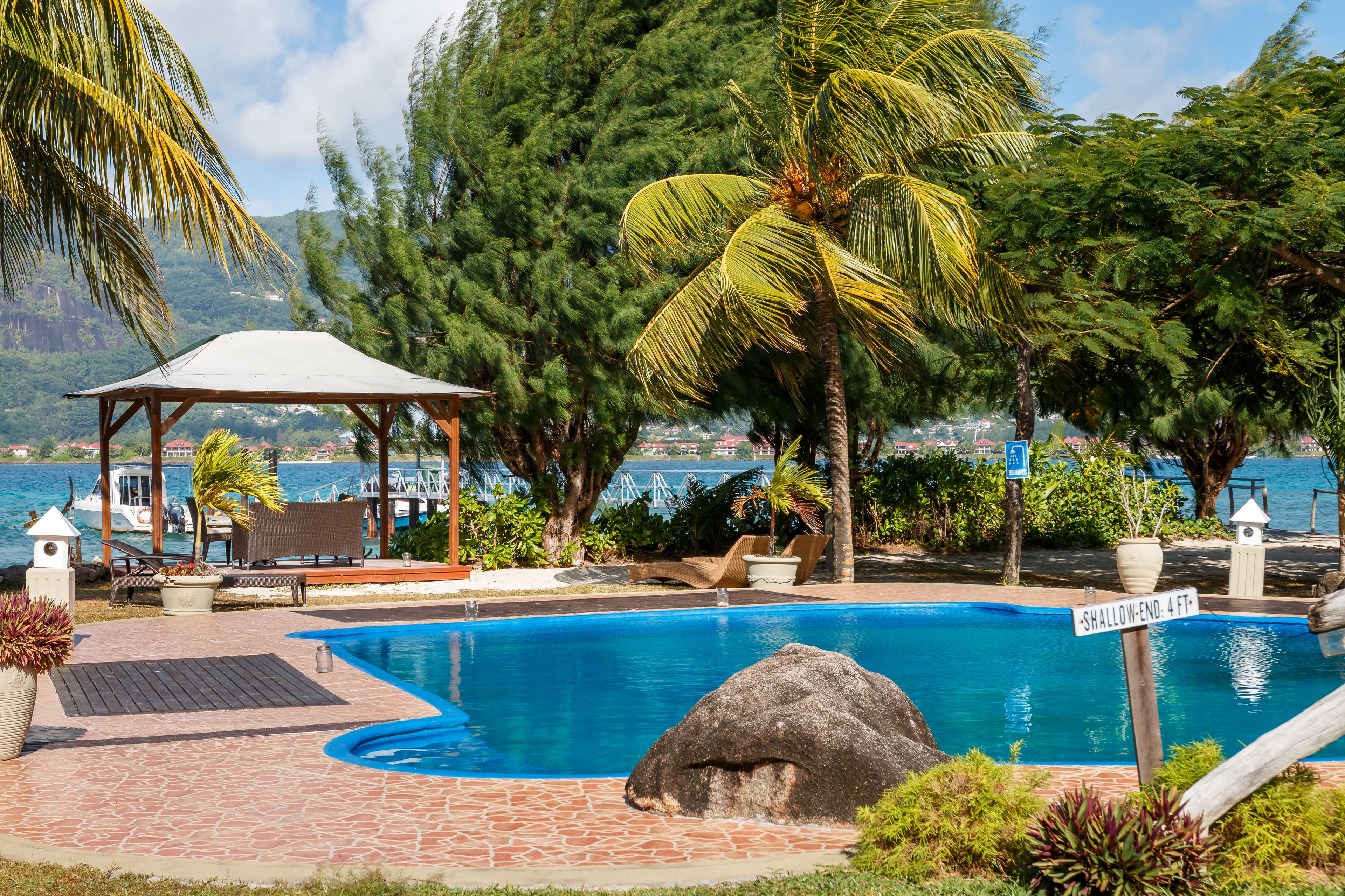 outdoor pool, pool umbrellas, pool loungers