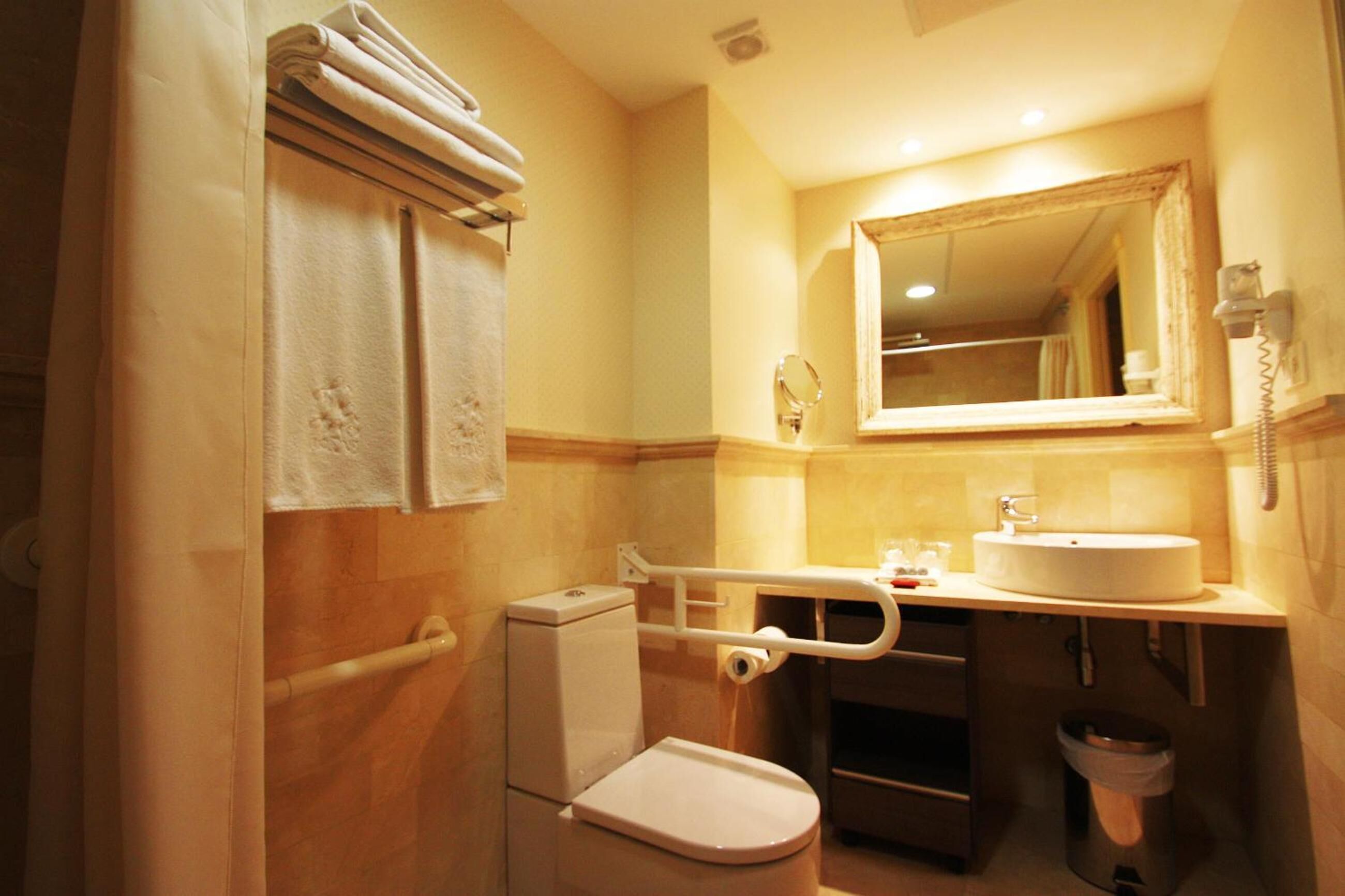 rainfall showerhead, designer toiletries, hair dryer, bidet