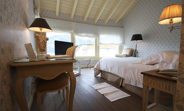 Premium bedding, memory-foam beds, in-room safe, desk