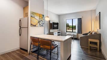 Suite, Accessible, Non Smoking | Living area | 32-inch plasma TV with cable channels, TV