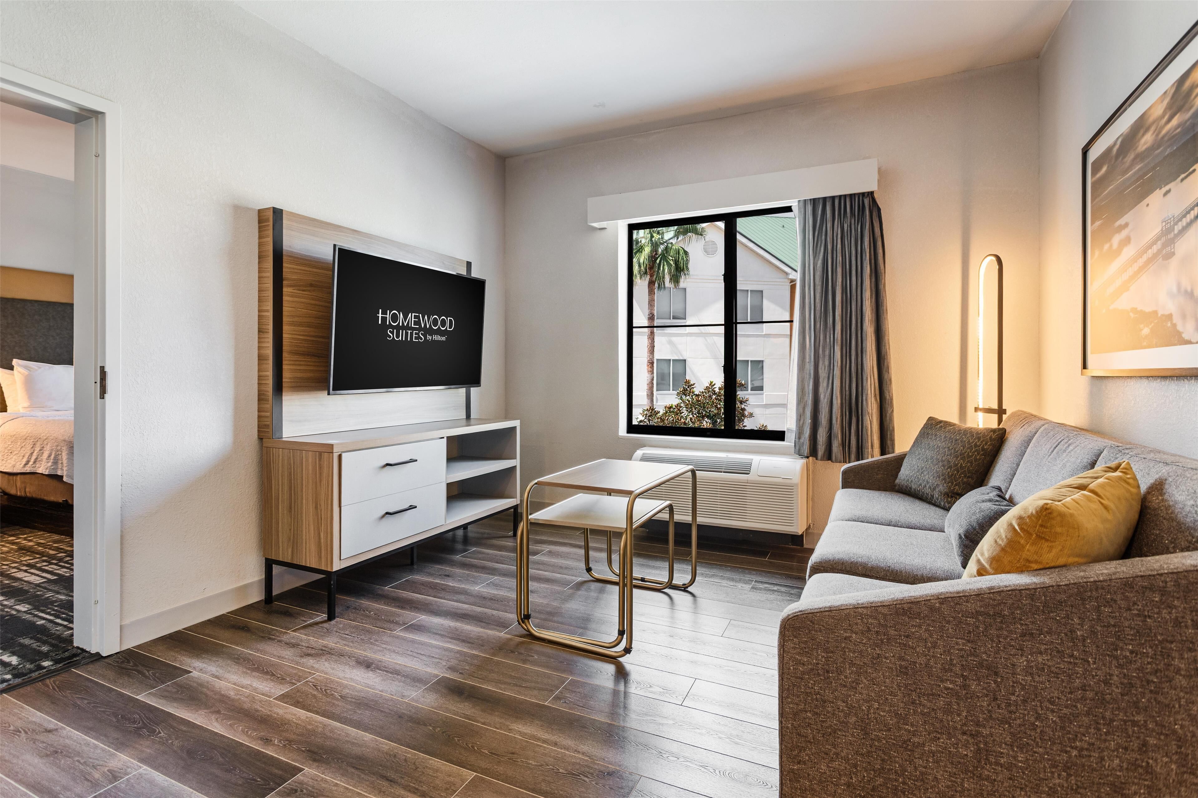 suite, non smoking | living area | 32-inch plasma tv with cable channels, tv