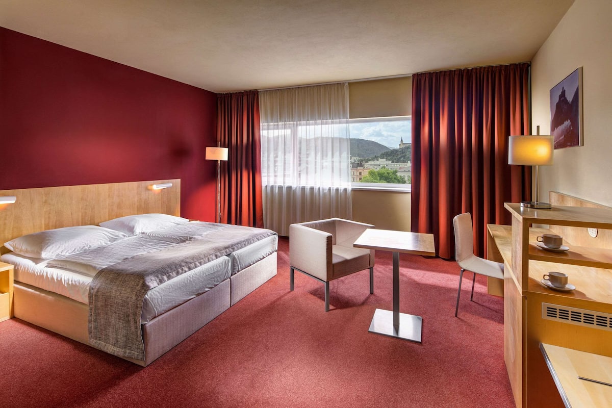 In-room safe, desk, blackout curtains, soundproofing