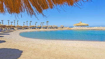 Private beach, sun loungers, beach umbrellas, beach towels