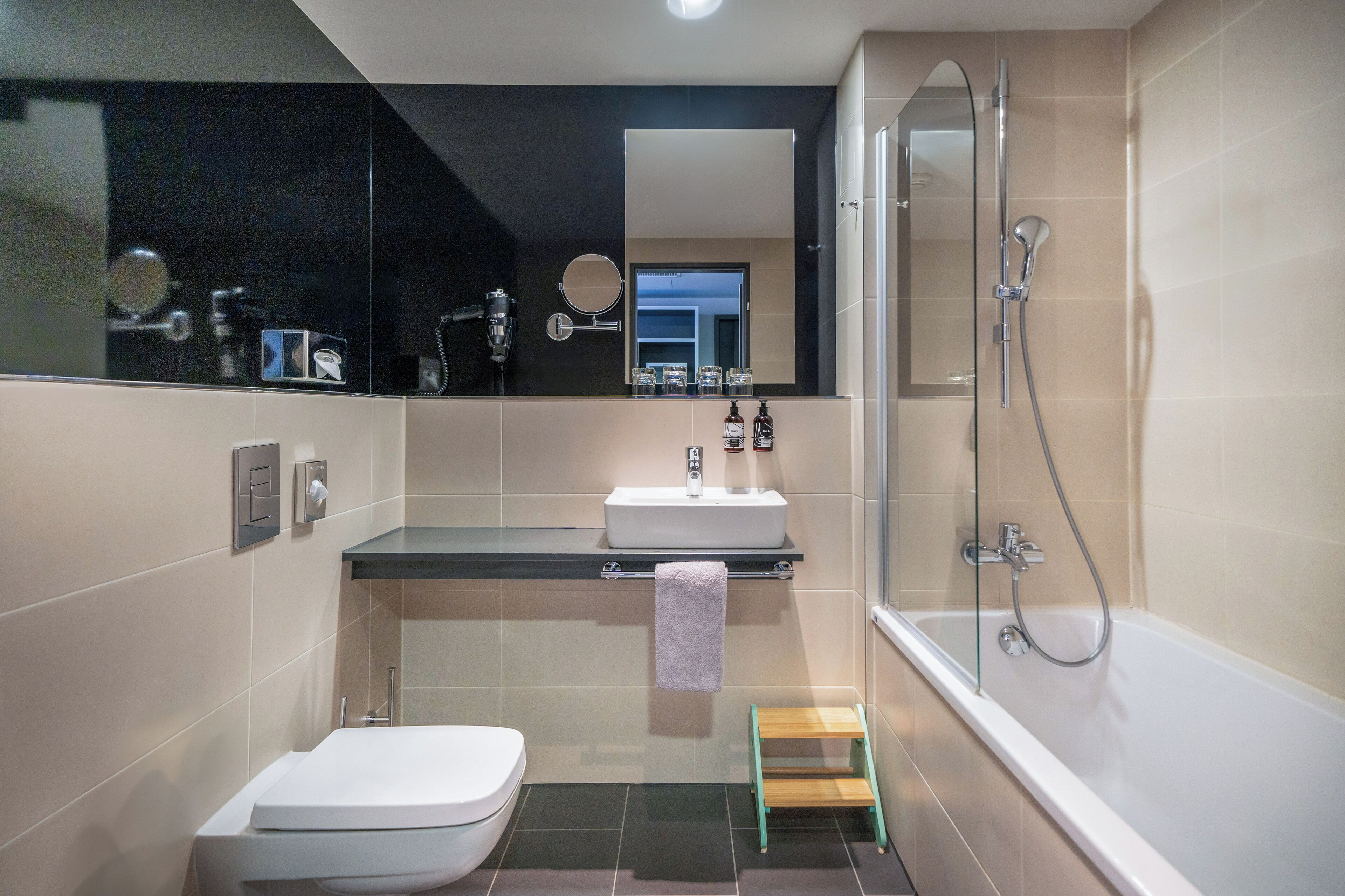 eco-friendly toiletries, hair dryer, towels, soap