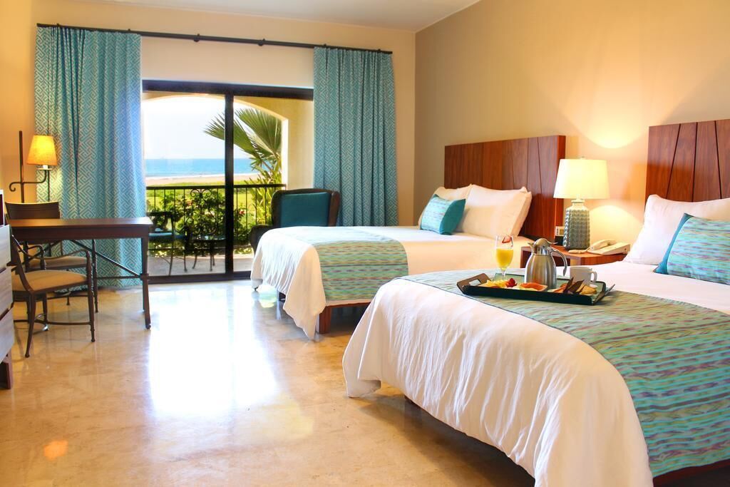 Premium bedding, down duvets, in-room safe, desk