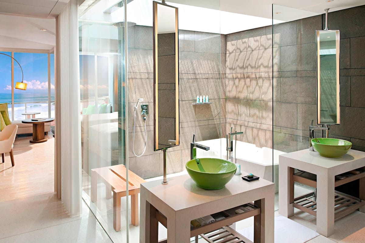 separate bathtub and shower, deep-soaking bathtub, rainfall showerhead