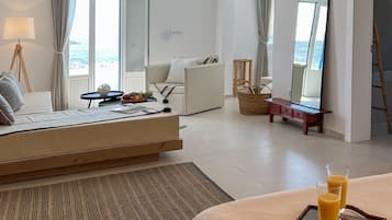 Suite ejecutiva, vistas al mar | Zona de estar