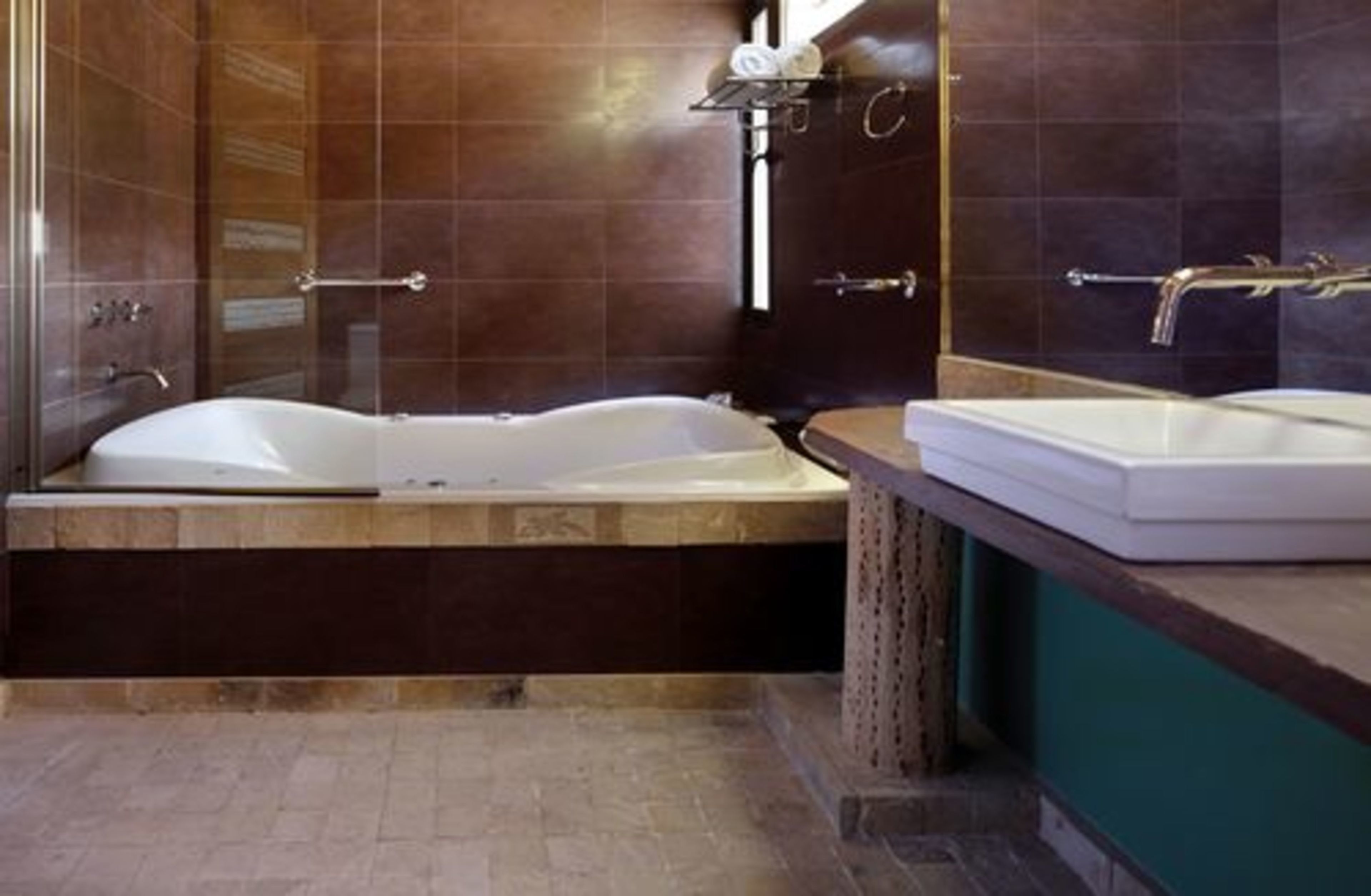 premium suite | bathroom | bathtub, free toiletries, hair dryer, bidet