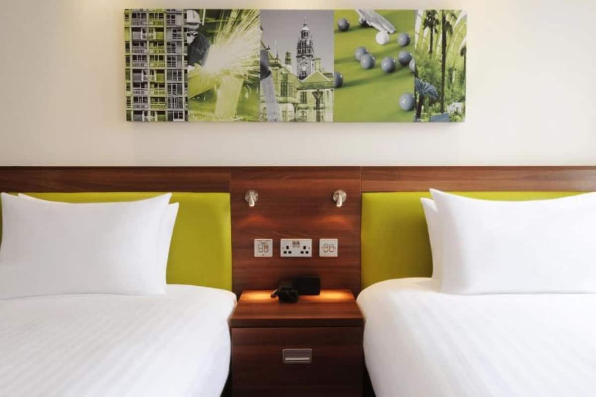 desk, laptop workspace, blackout curtains, iron/ironing board