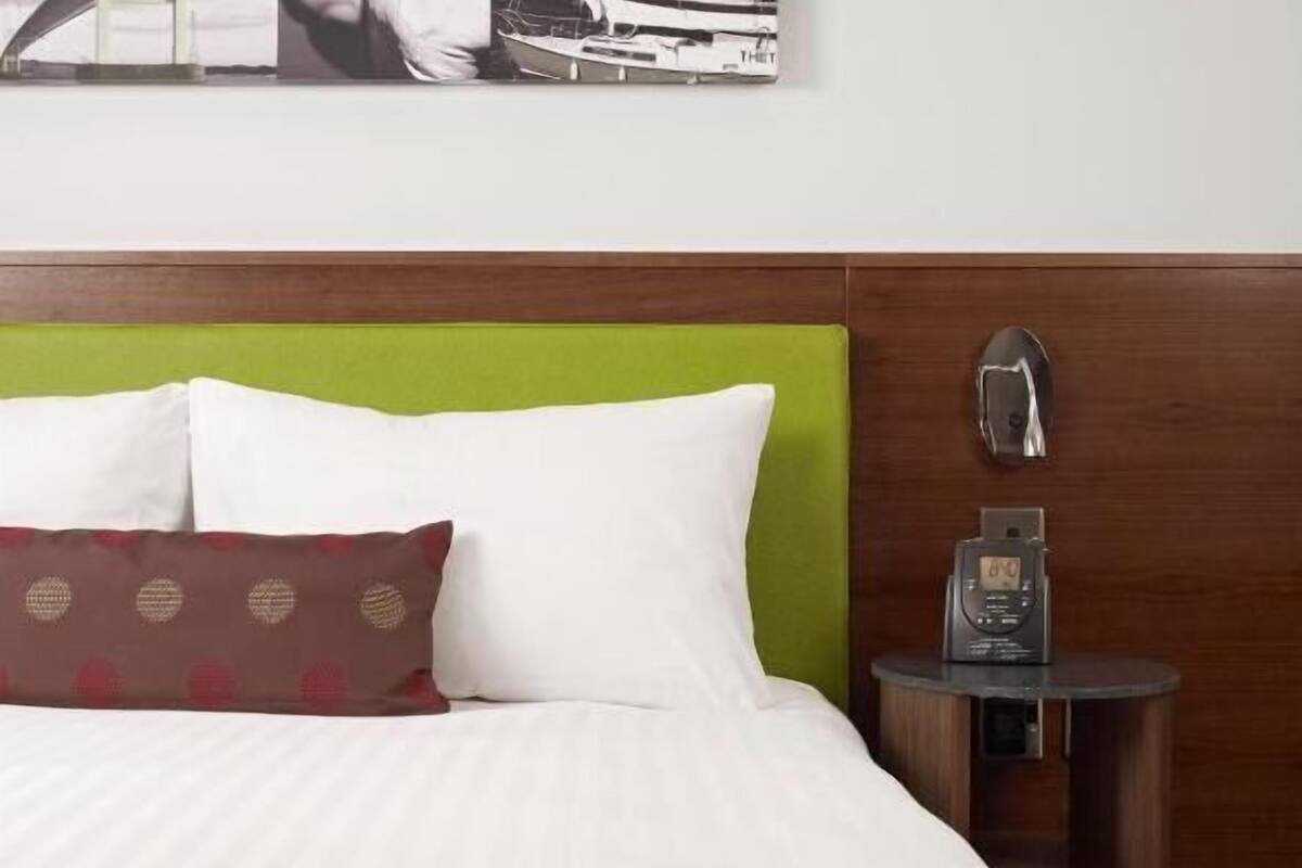 desk, laptop workspace, blackout curtains, iron/ironing board