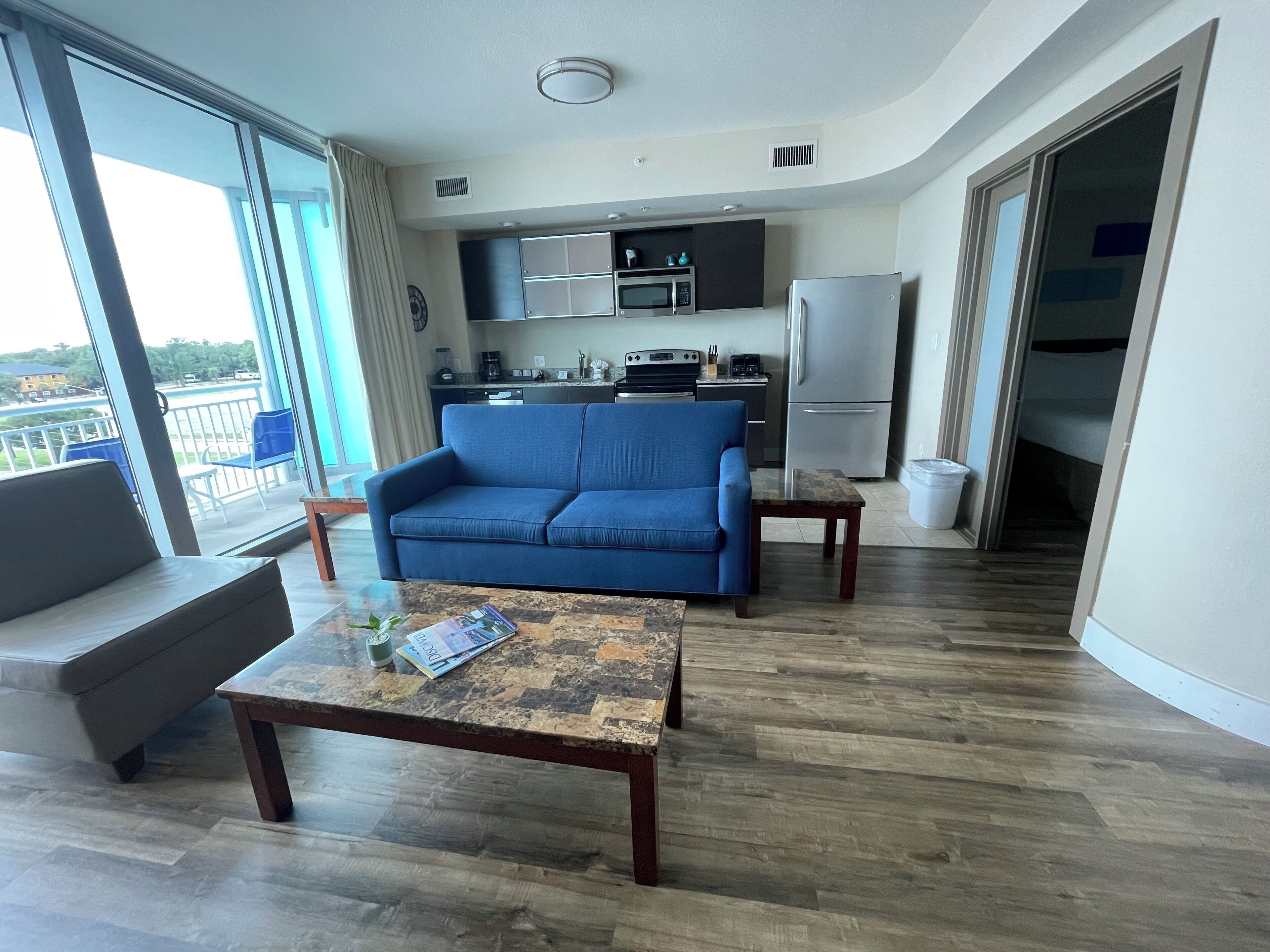 1 bedroom suite, partial beach view | living area | 32-inch lcd tv with digital channels, tv, mp3 dock