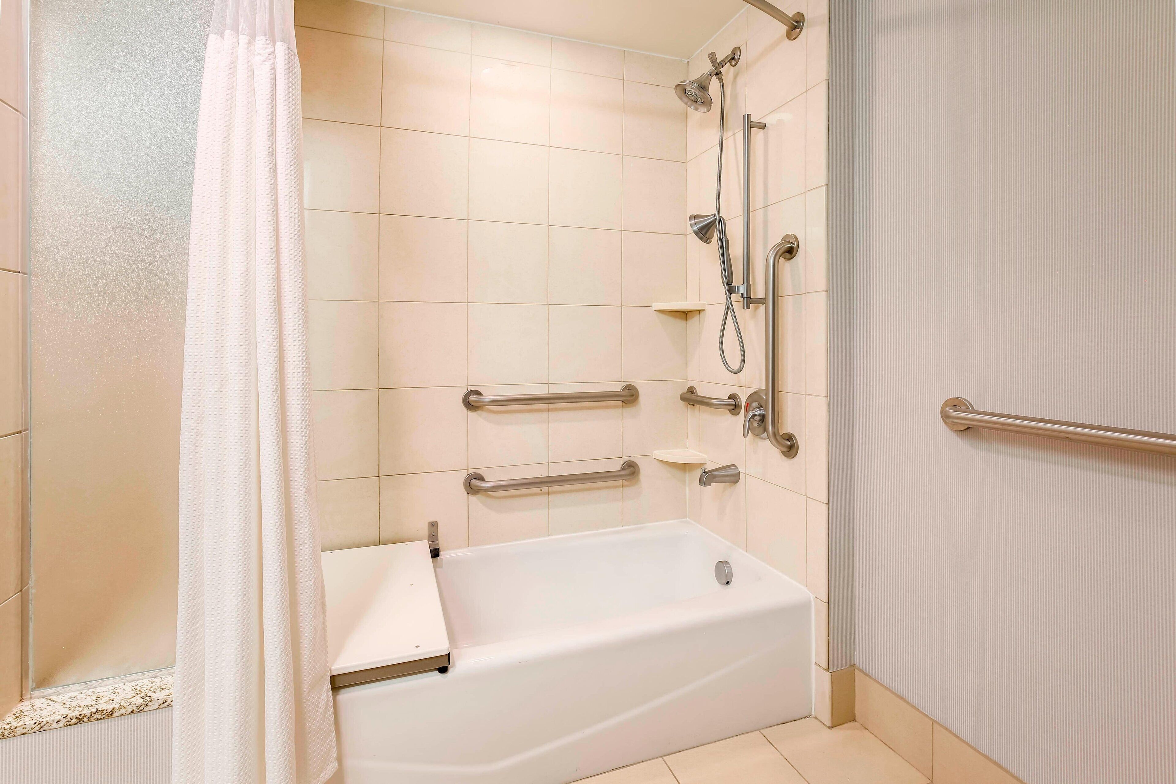 combined shower/bathtub, free toiletries, hair dryer, towels