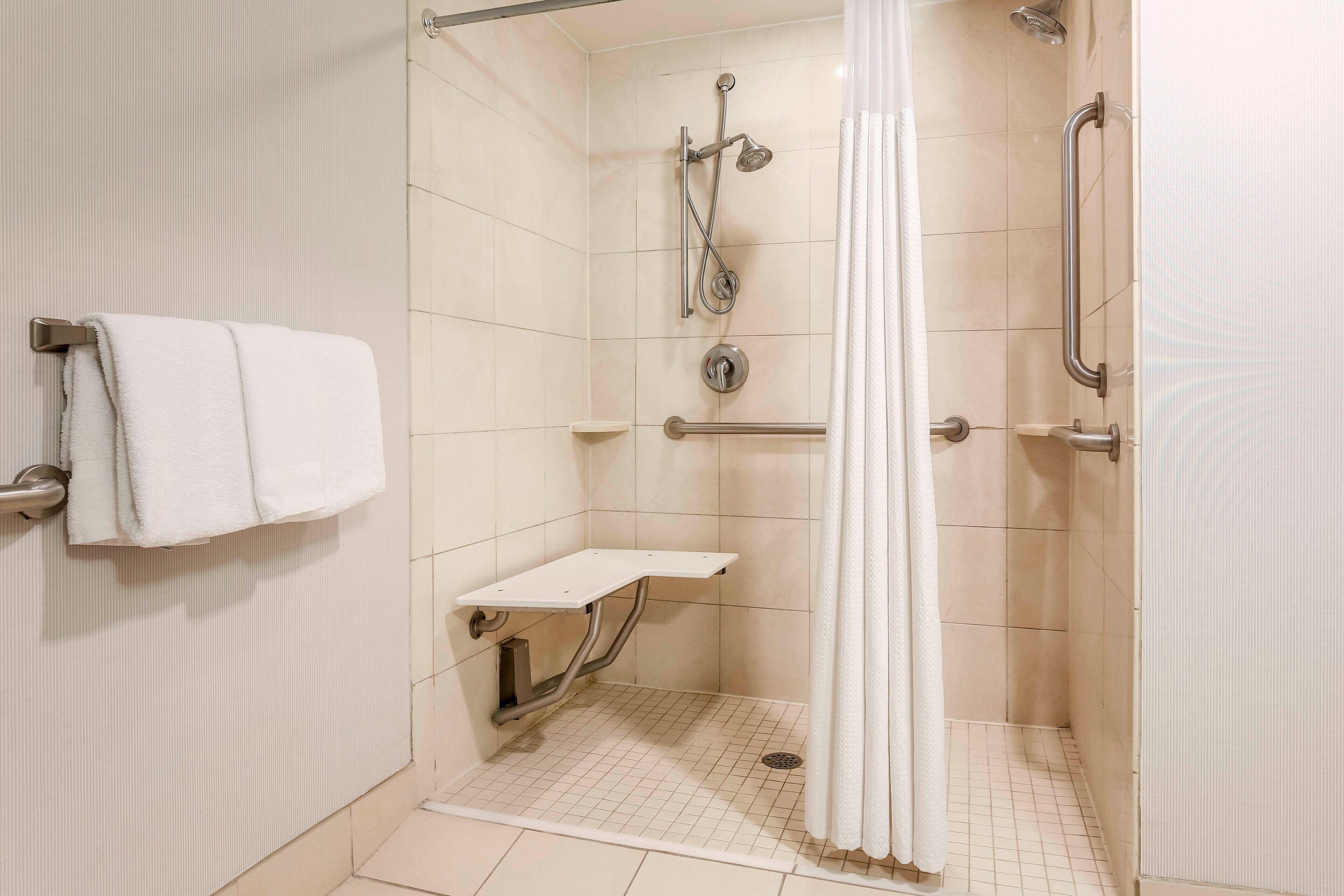 combined shower/bathtub, free toiletries, hair dryer, towels