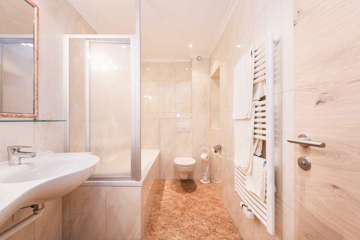 hair dryer, bathrobes, towels, soap