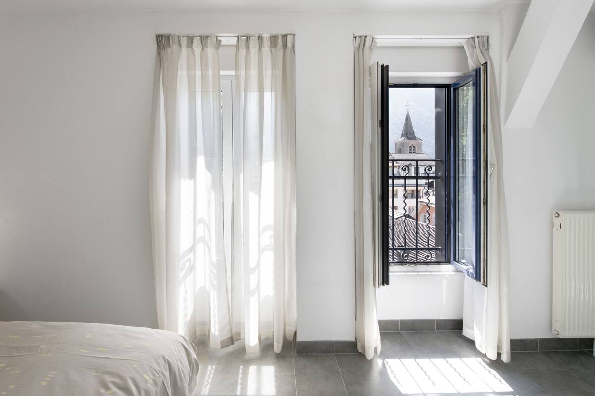 family triple room, lake view | 1 bedroom, in-room safe, desk, laptop workspace