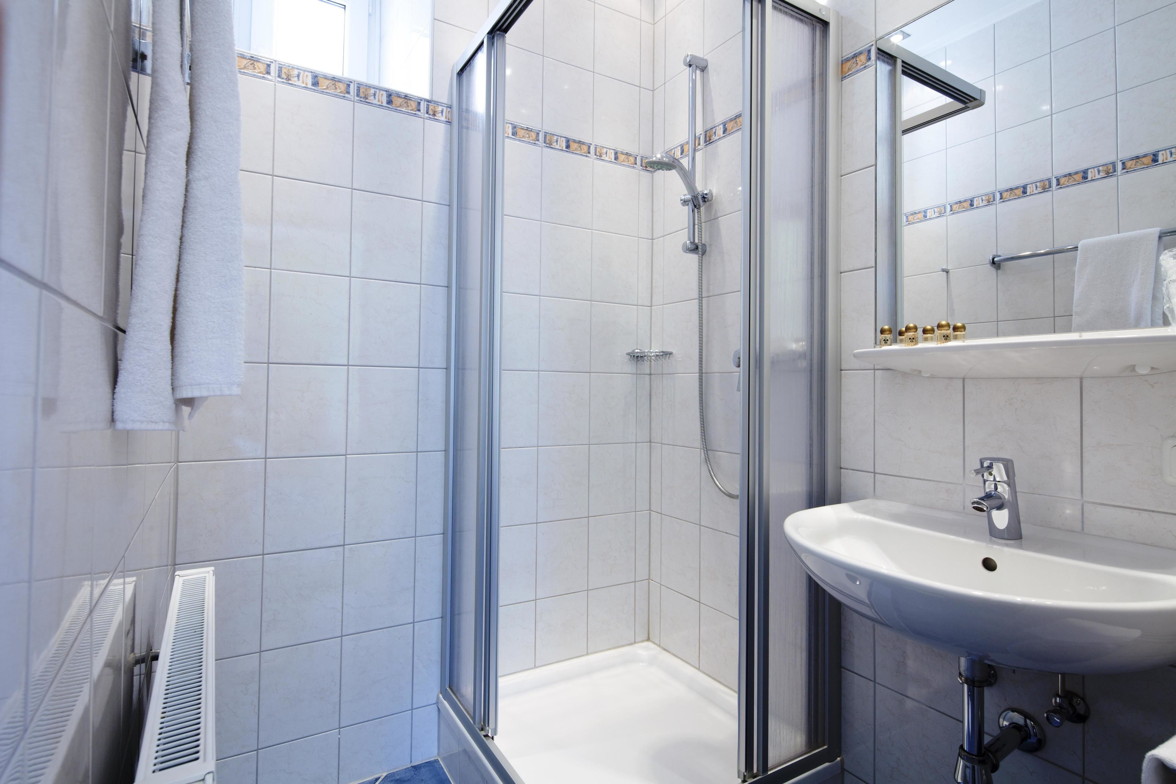 single room | bathroom | shower, hair dryer, towels