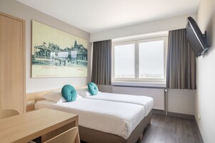 Cortinas blackout, wifi gratis y ropa de cama 