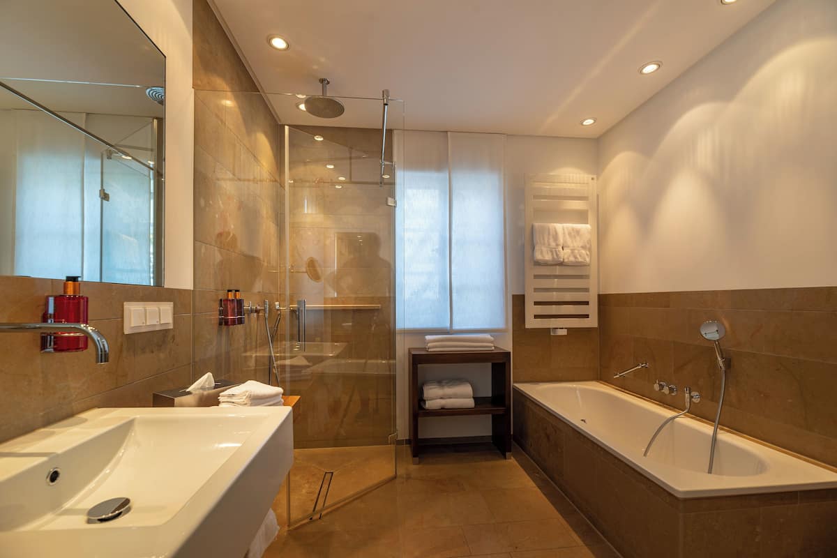 duplex | bathroom | hair dryer, bathrobes, slippers, towels