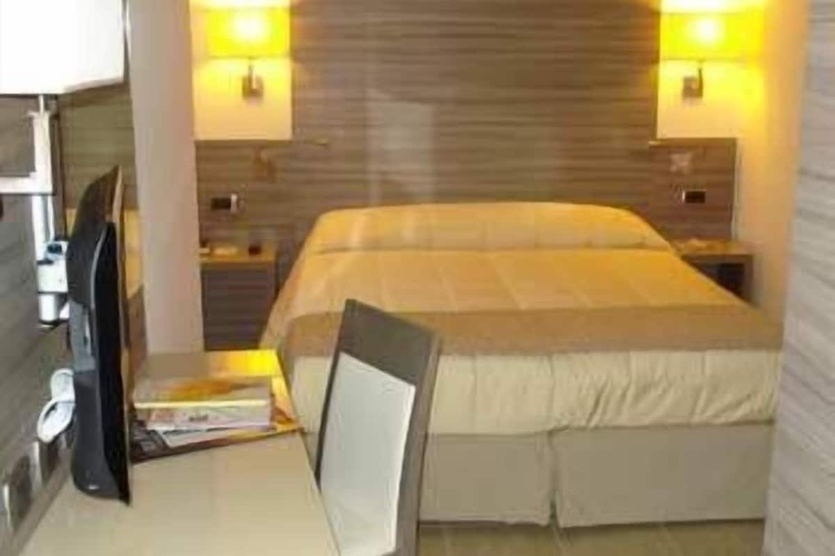 Camera con letto matrimoniale o 2 letti singoli | Biancheria da letto di alta qualità, materassi Select Comfort, minibar