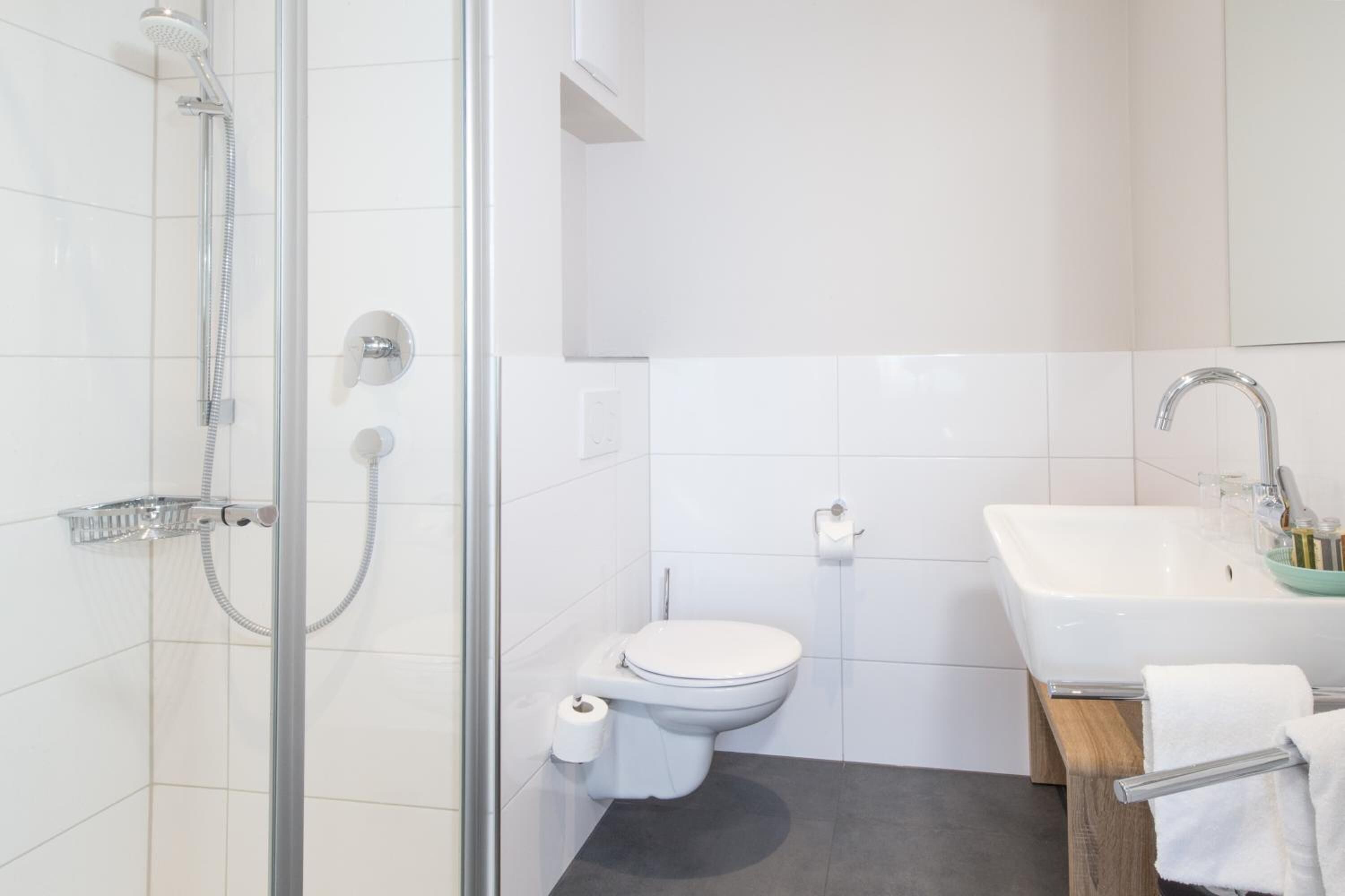 shower, rainfall showerhead, towels