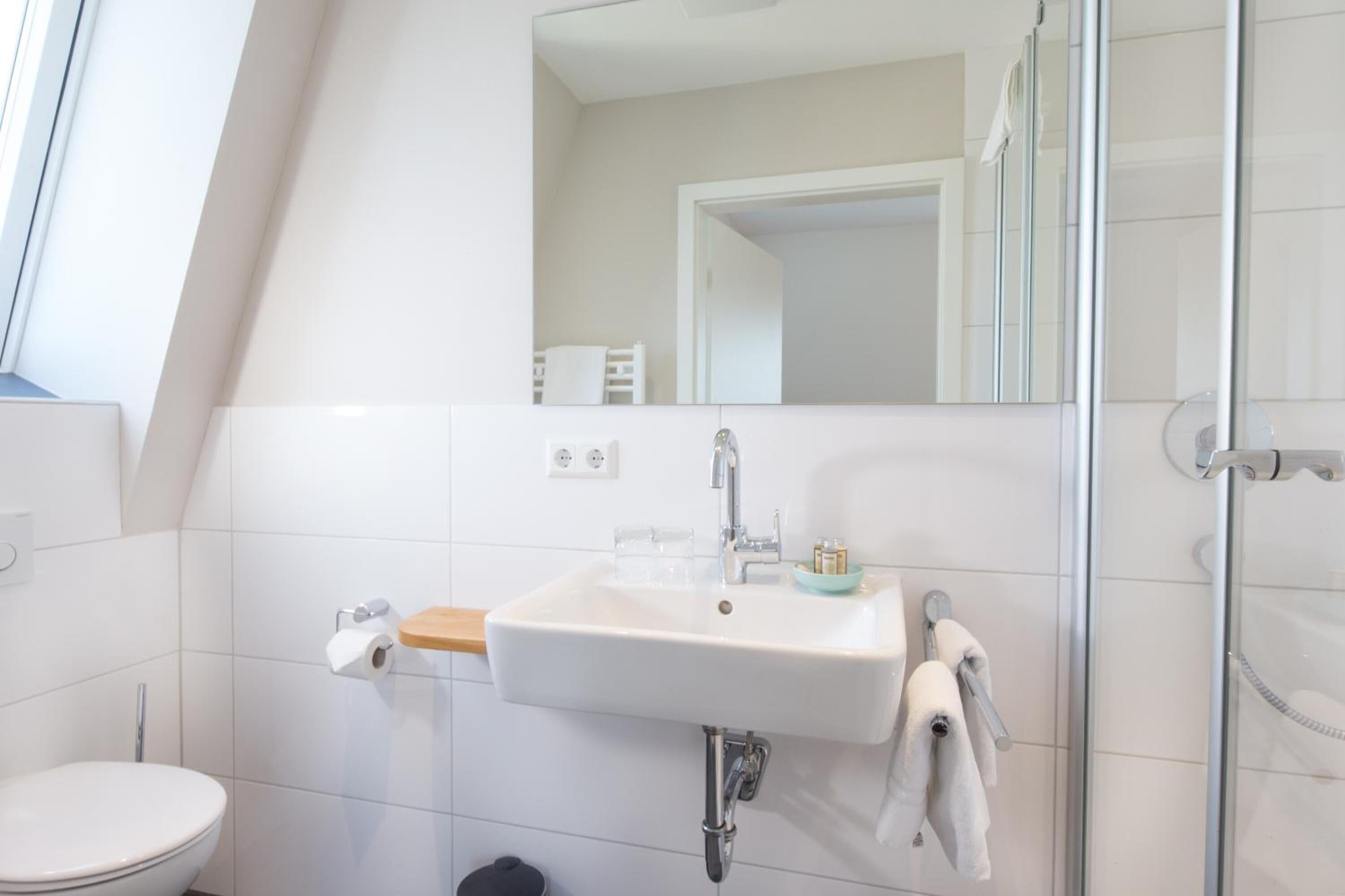 shower, rainfall showerhead, towels