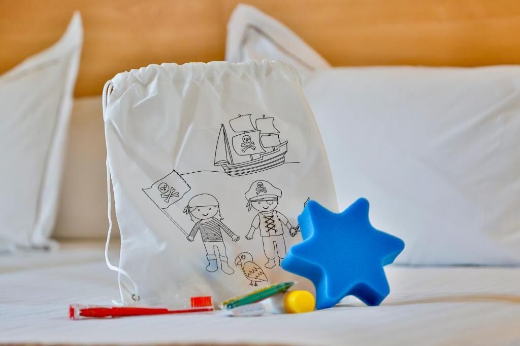 premium bedding, free minibar, in-room safe, desk