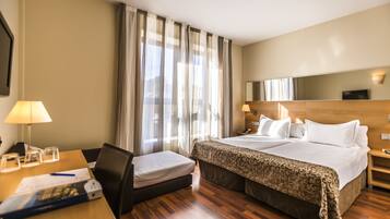 Ropa de cama de alta calidad y minibar con artículos gratuitos