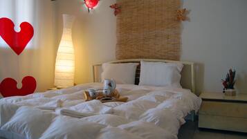 Standaard kamer, uitzicht op zee | 1 slaapkamer, Select Comfort-bedden, een kluis op de kamer