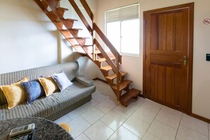 Apartamento Mezanino | Sala de estar | TV