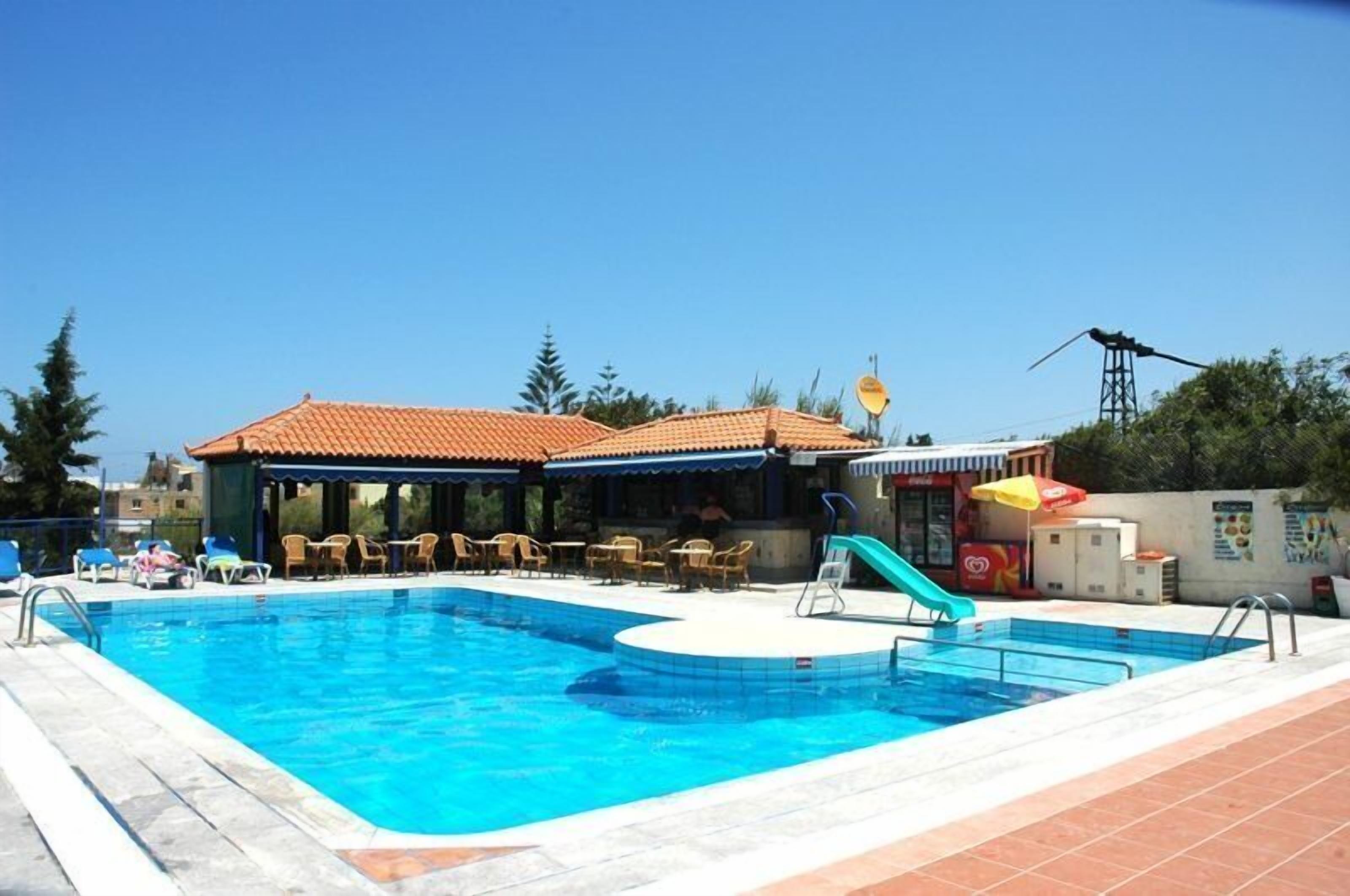 Outdoor pool, pool umbrellas, pool loungers