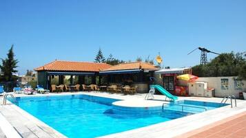 Outdoor pool, pool umbrellas, pool loungers