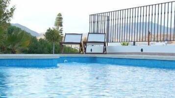 Outdoor pool, pool loungers
