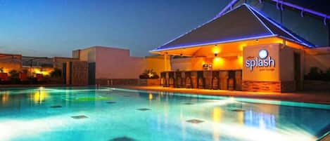 Outdoor pool, open 8:00 AM to 10:00 PM, lifeguards on site