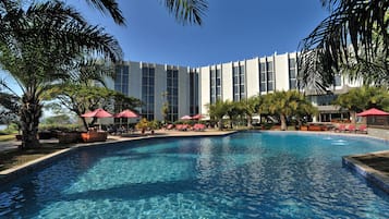 Outdoor pool, pool umbrellas, sun loungers