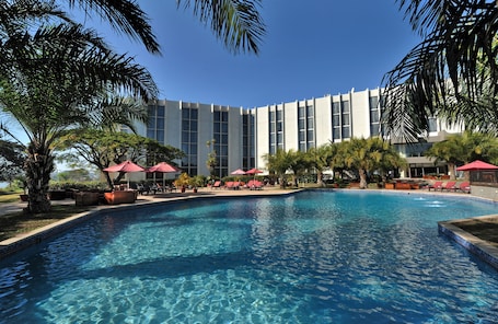 Outdoor pool, pool umbrellas, sun loungers