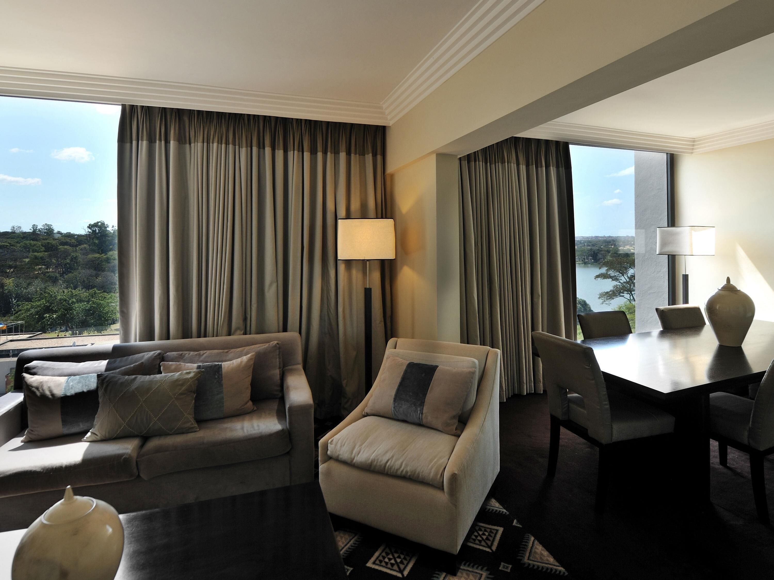 Deluxe Suite, 1 Queen Bed, Lake View | In-room safe, soundproofing, free cribs/infant beds, free rollaway beds