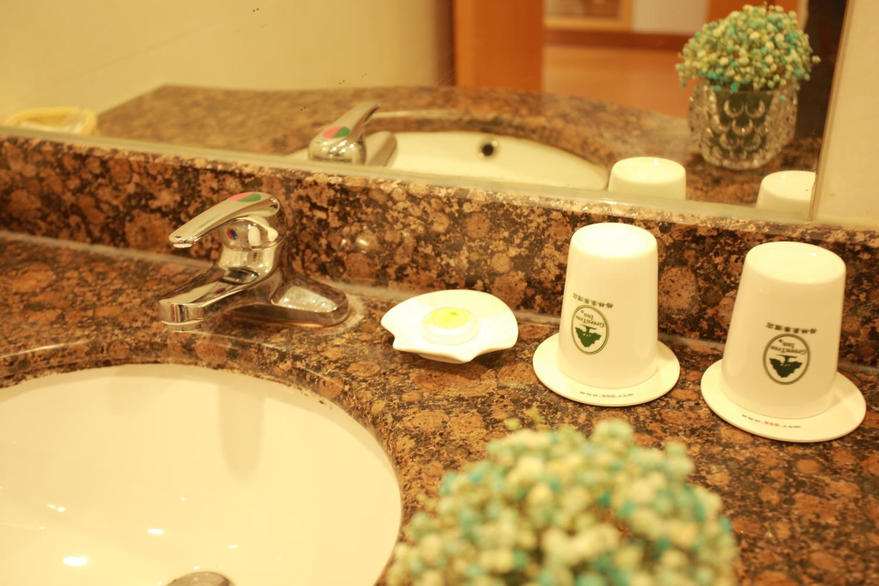 combined shower/bathtub, free toiletries, hair dryer, slippers