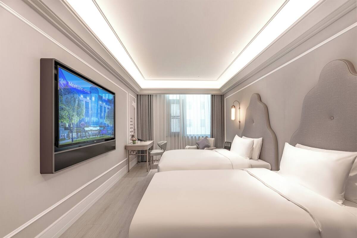 Premium bedding, down duvets, memory-foam beds, minibar