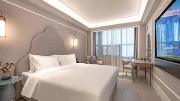 Premium bedding, down duvets, memory-foam beds, minibar