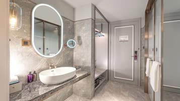 Premium bedding, down duvets, memory-foam beds, minibar