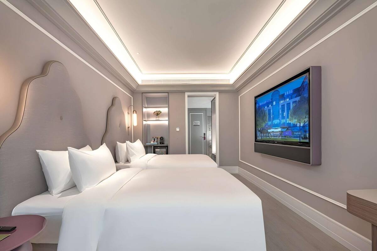 デラックス ルーム シングルベッド 2 台 | 高級寝具、羽毛の掛け布団、低反発ベッド、ミニバー