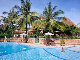 Outdoor pool, pool umbrellas, sun loungers