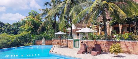 Outdoor pool, pool umbrellas, pool loungers